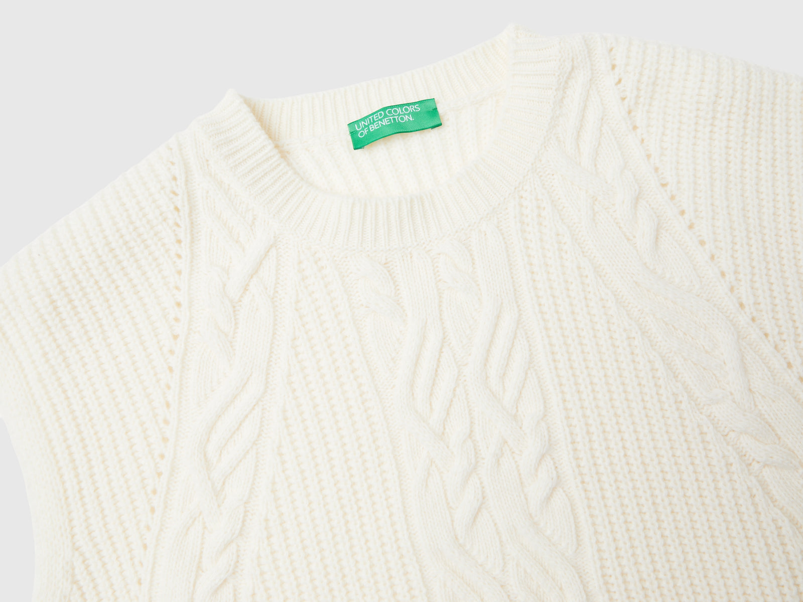 Gilet con trecce da donna bianco panna 3 | Benetton Outlet