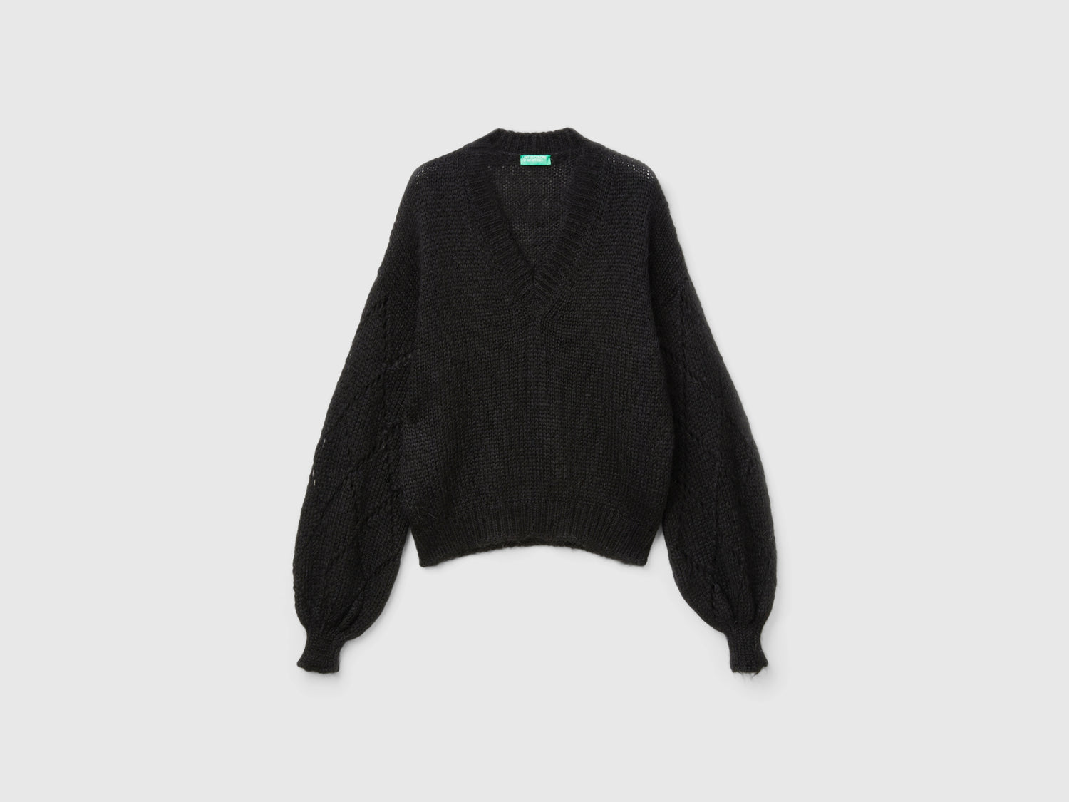 Maglione con manica traforata da donna nero | Benetton Outlet