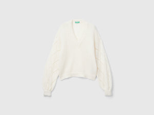 Maglione con manica traforata