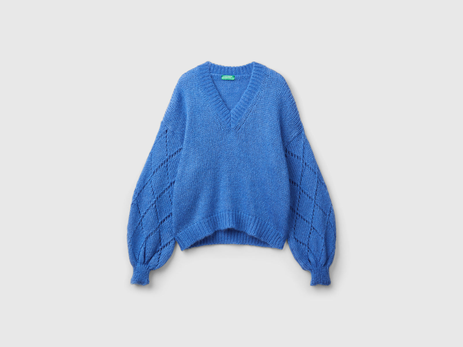 Sweater with perforated sleeves da donna blu | Benetton Outlet