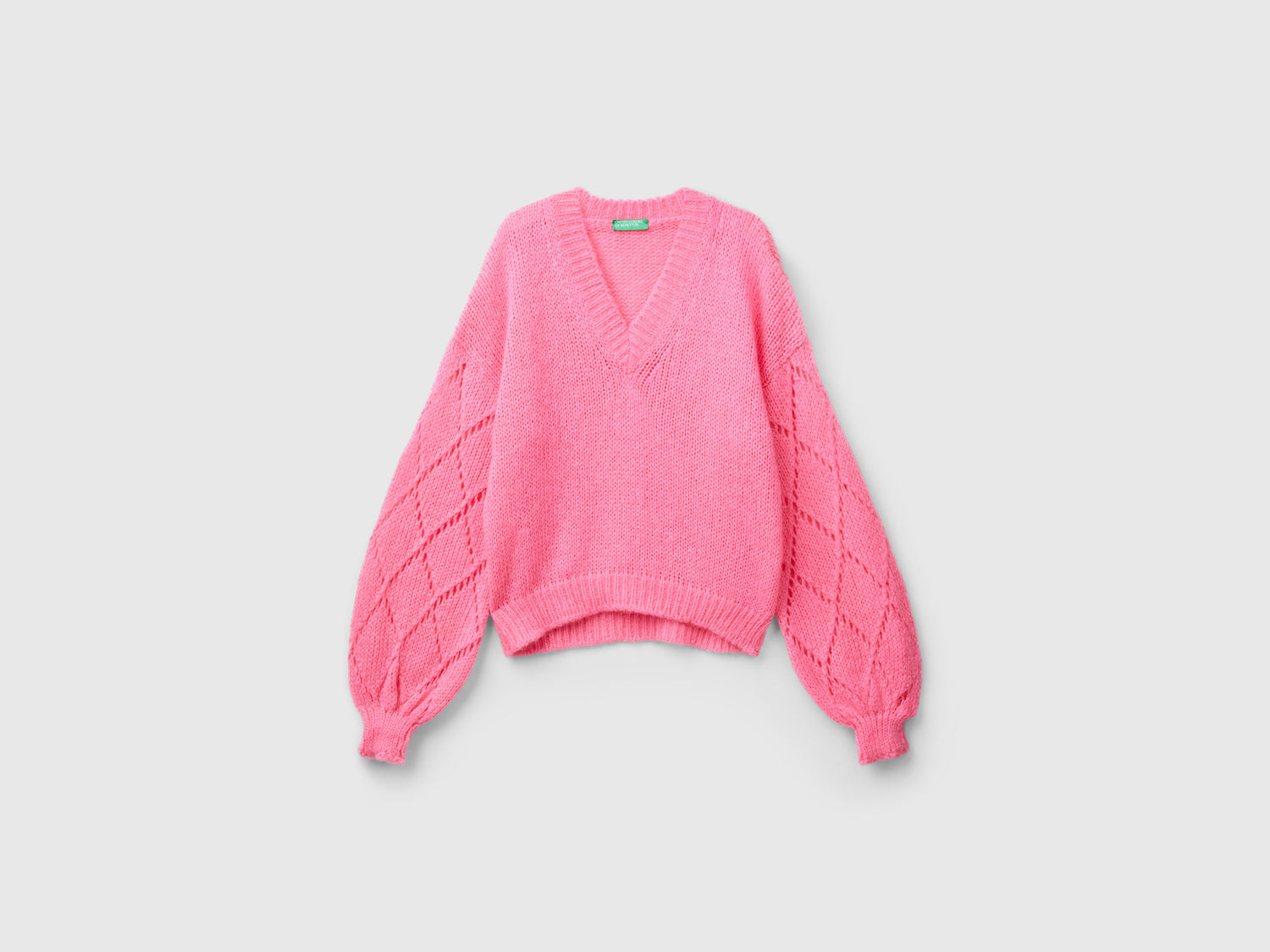 Maglione con manica traforata da donna rosa | Benetton Outlet
