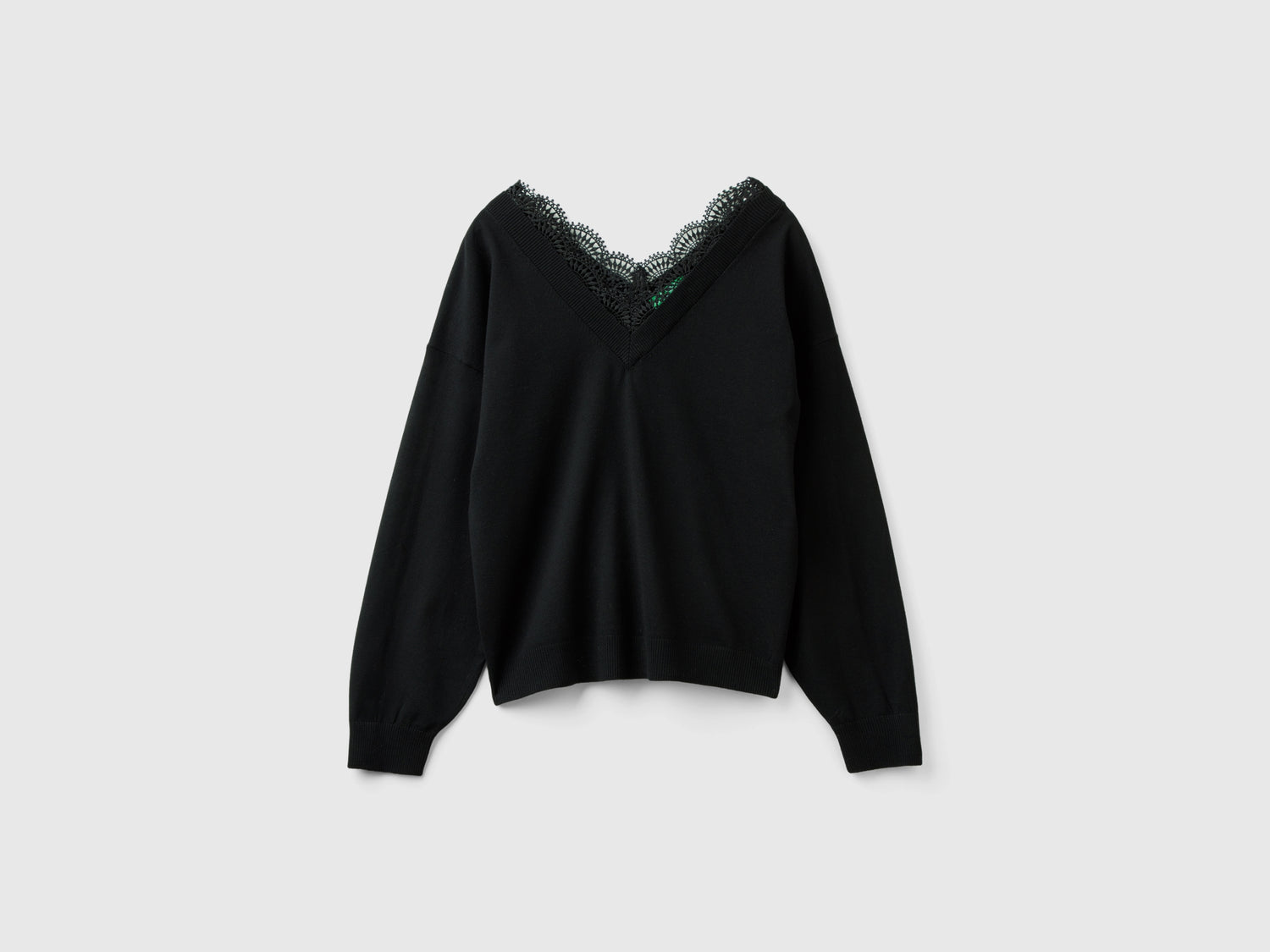 Maglia fluida con pizzo da donna nero | Benetton Outlet