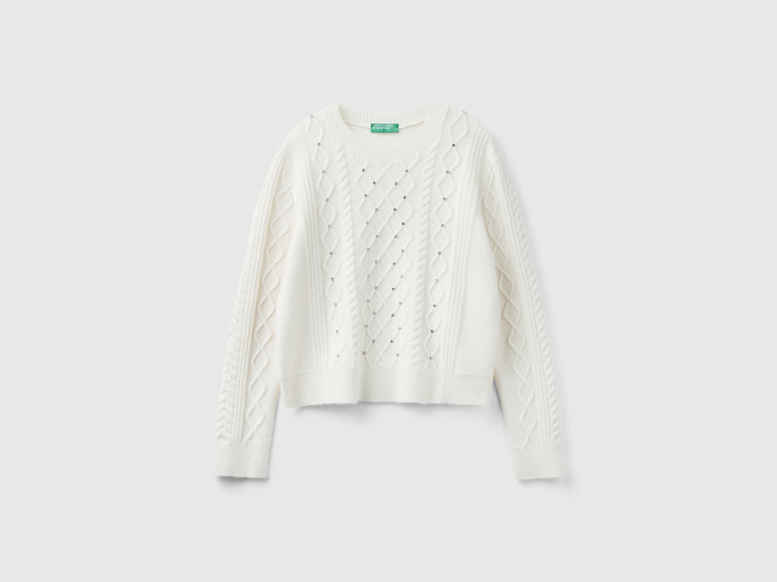Sweater with braids and rhinestones da donna bianco panna | Benetton Outlet