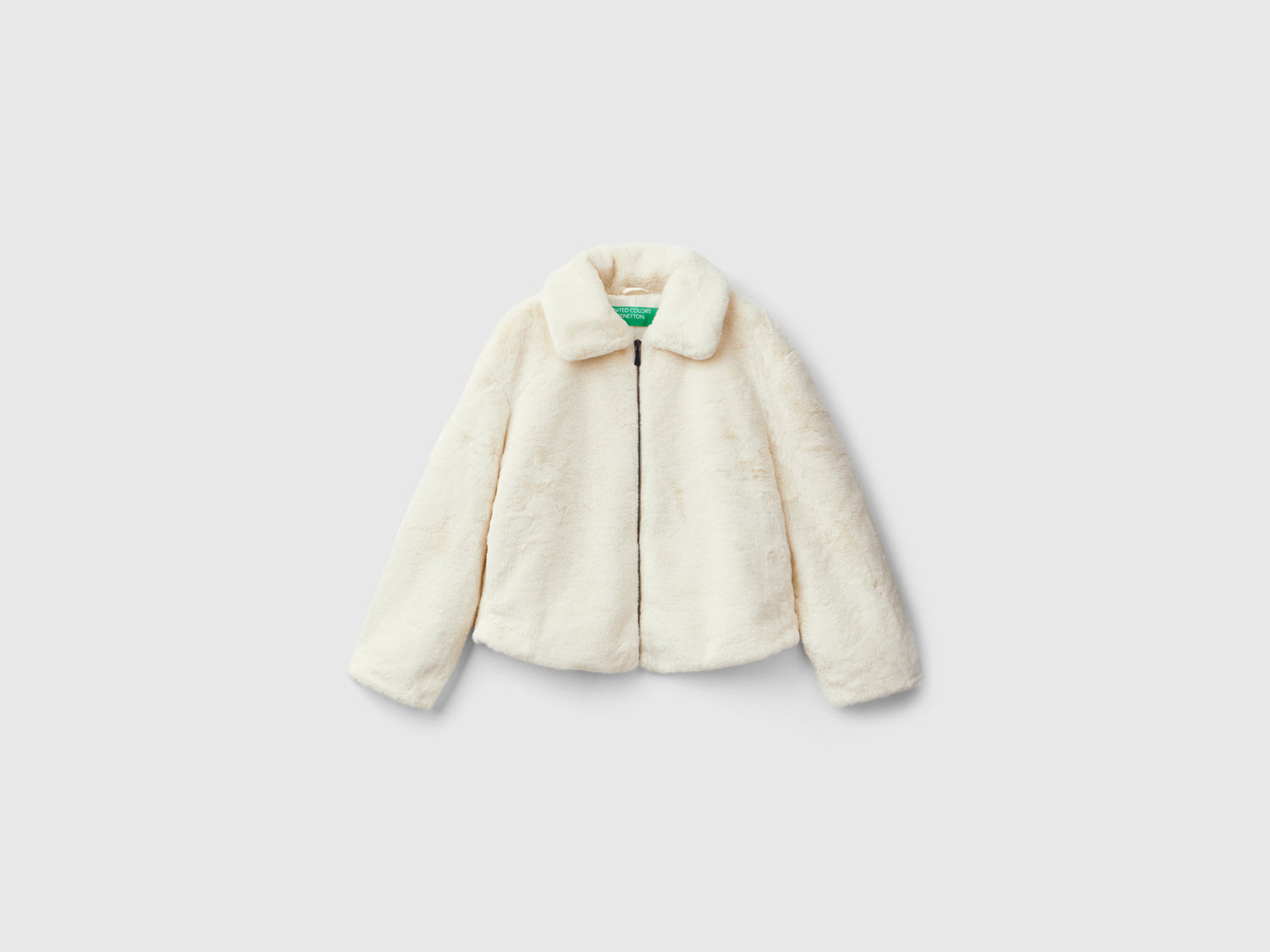 Giubbino in pelliccia sintetica da donna bianco panna | Benetton Outlet