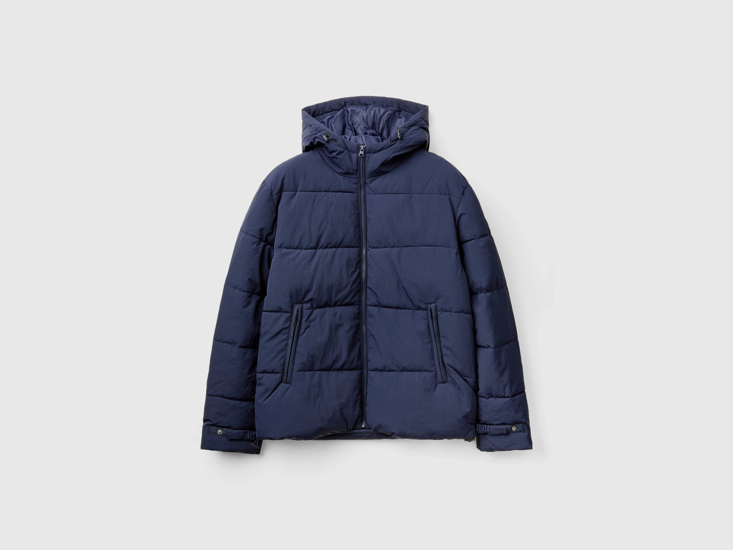 Giubbotto imbottito con cappuccio da uomo blu | Benetton Outlet