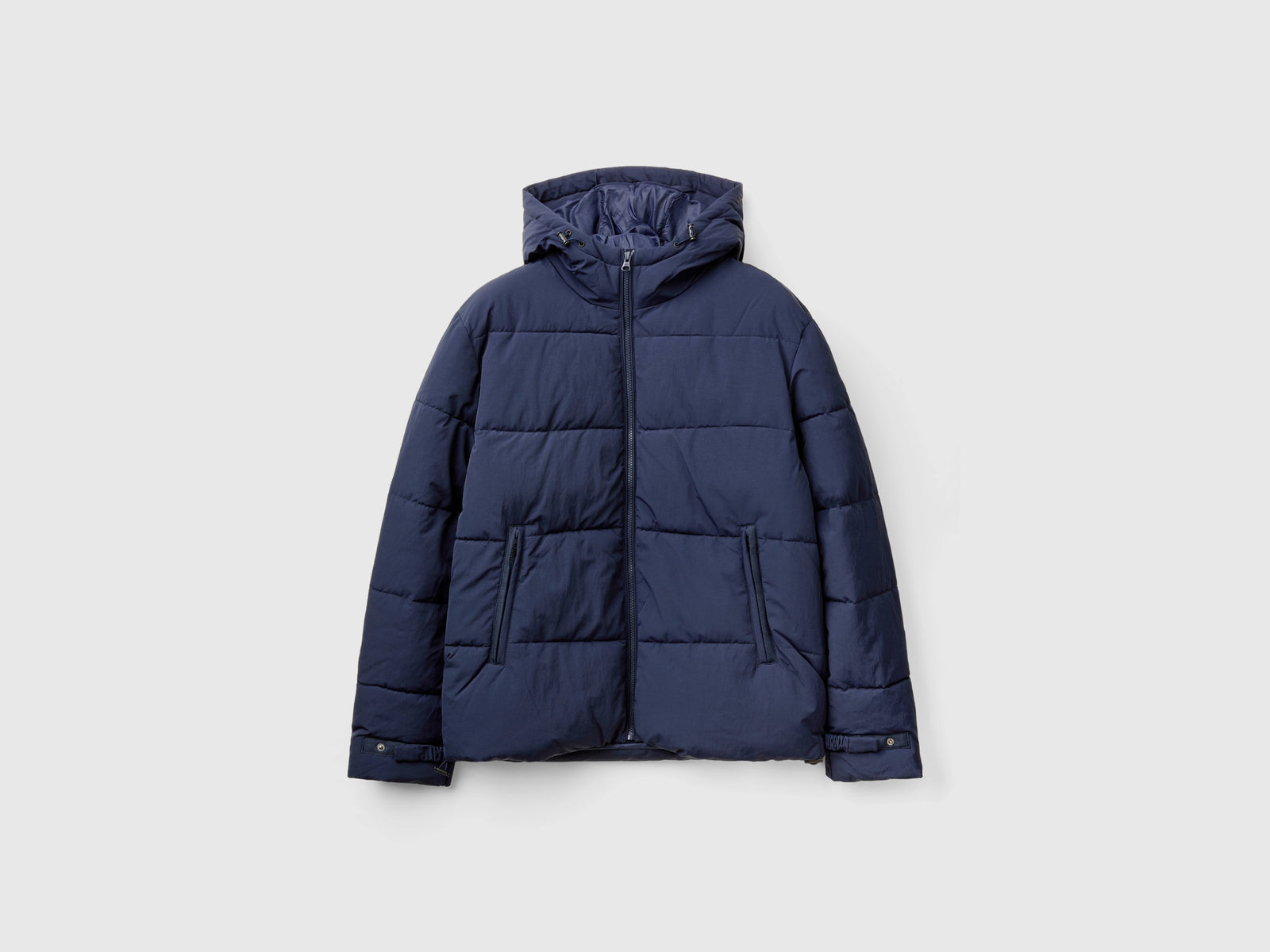 Giubbotto imbottito con cappuccio da uomo blu | Benetton Outlet