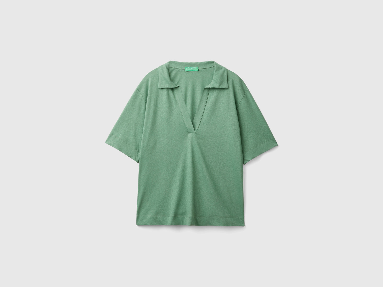 Polo in misto cotone e lino da donna verde | Benetton Outlet