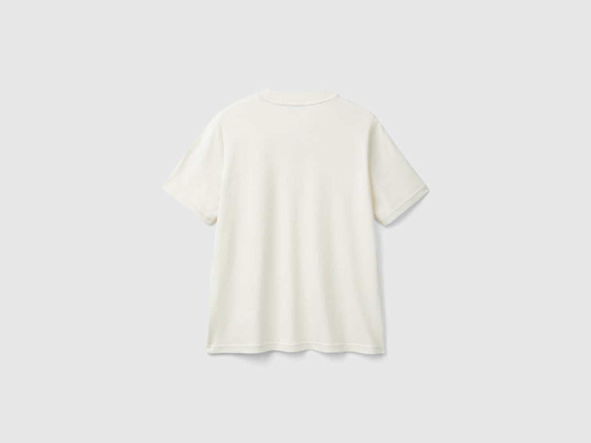 T-shirt con applicazioni effetto gioiello