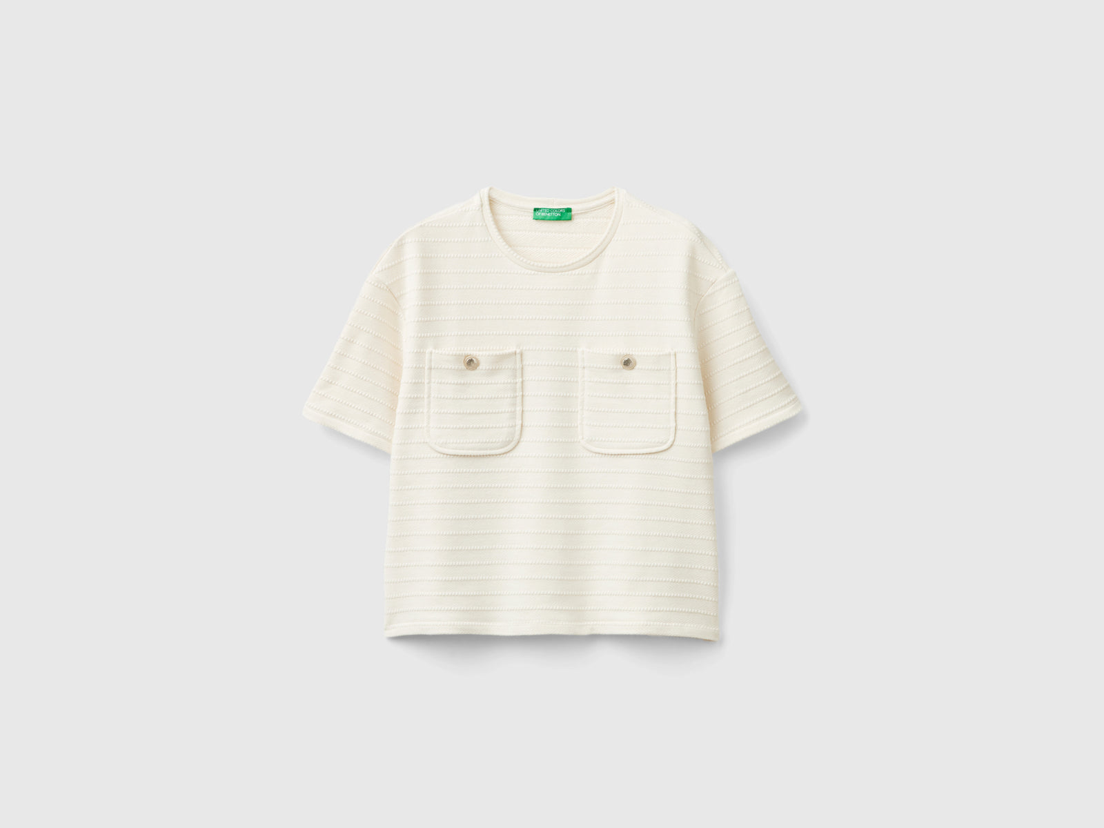 Maglietta girocollo con taschini da donna bianco panna | Benetton Outlet