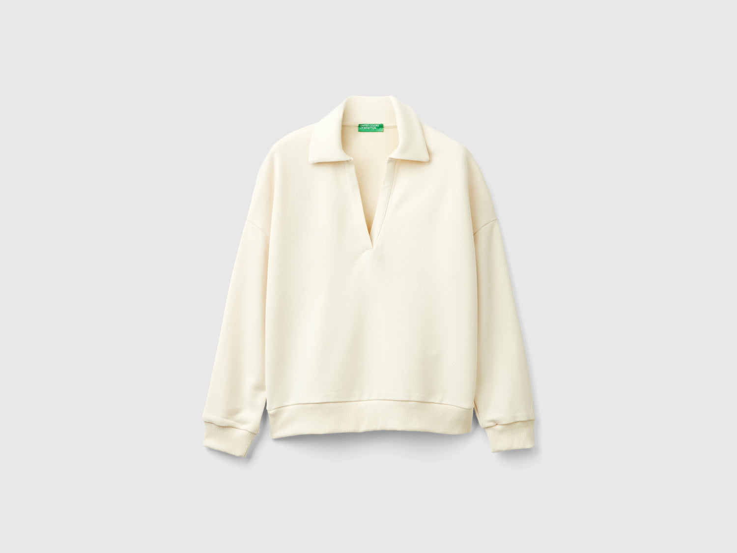 V-neck sweatshirt polo da donna bianco panna | Benetton Outlet