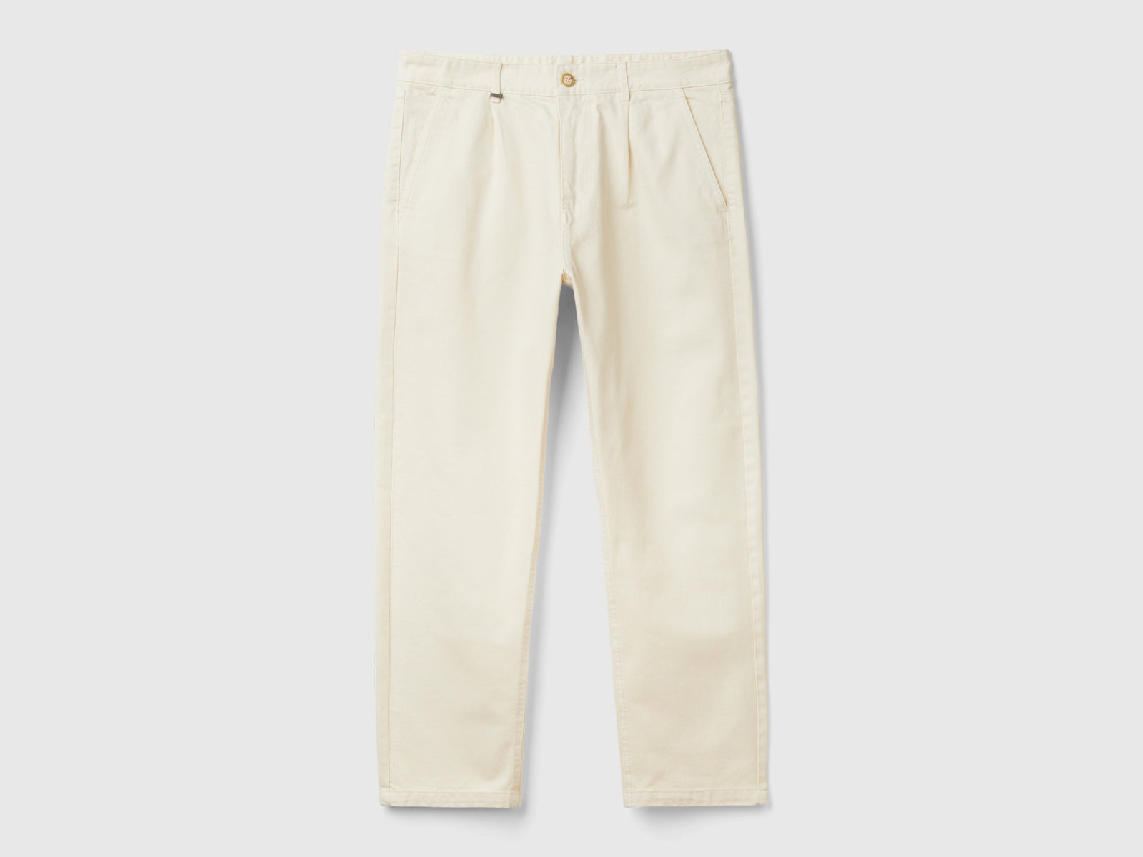 Pantaloni carrot fit da uomo bianco panna | Benetton Outlet