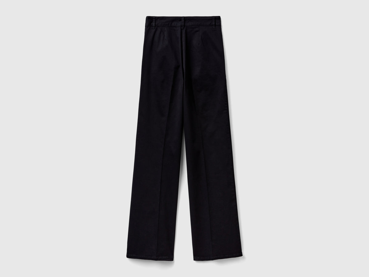 Pantalones acampanados de algodón elástico