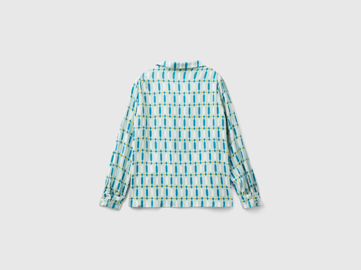 Blusa in raso con fantasia geometrica