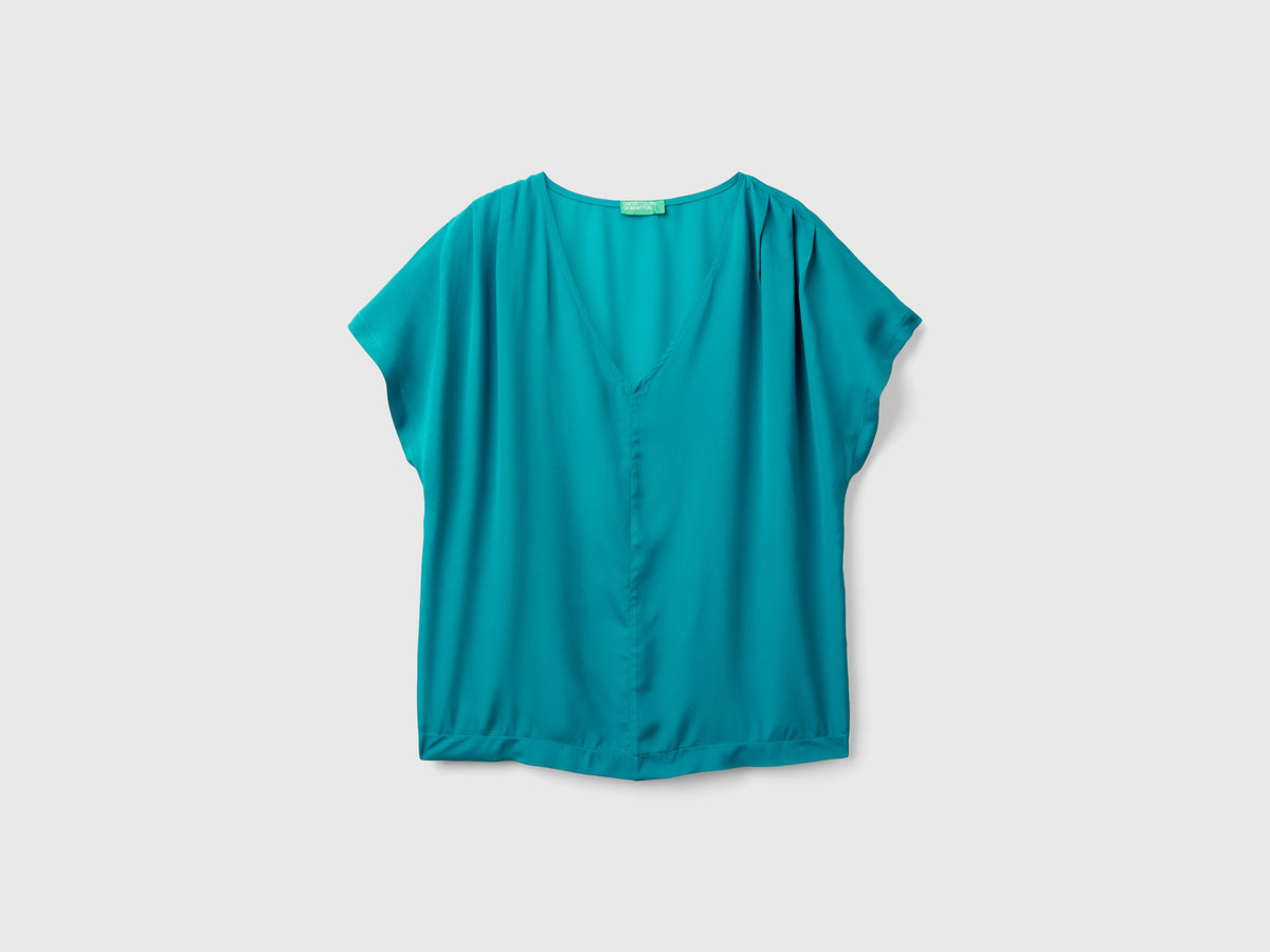 Blusa fluida a manica corta