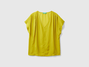 Blusa fluida a manica corta