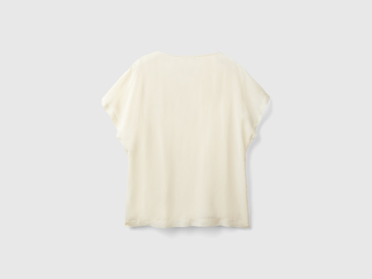 Blusa fluida a manica corta
