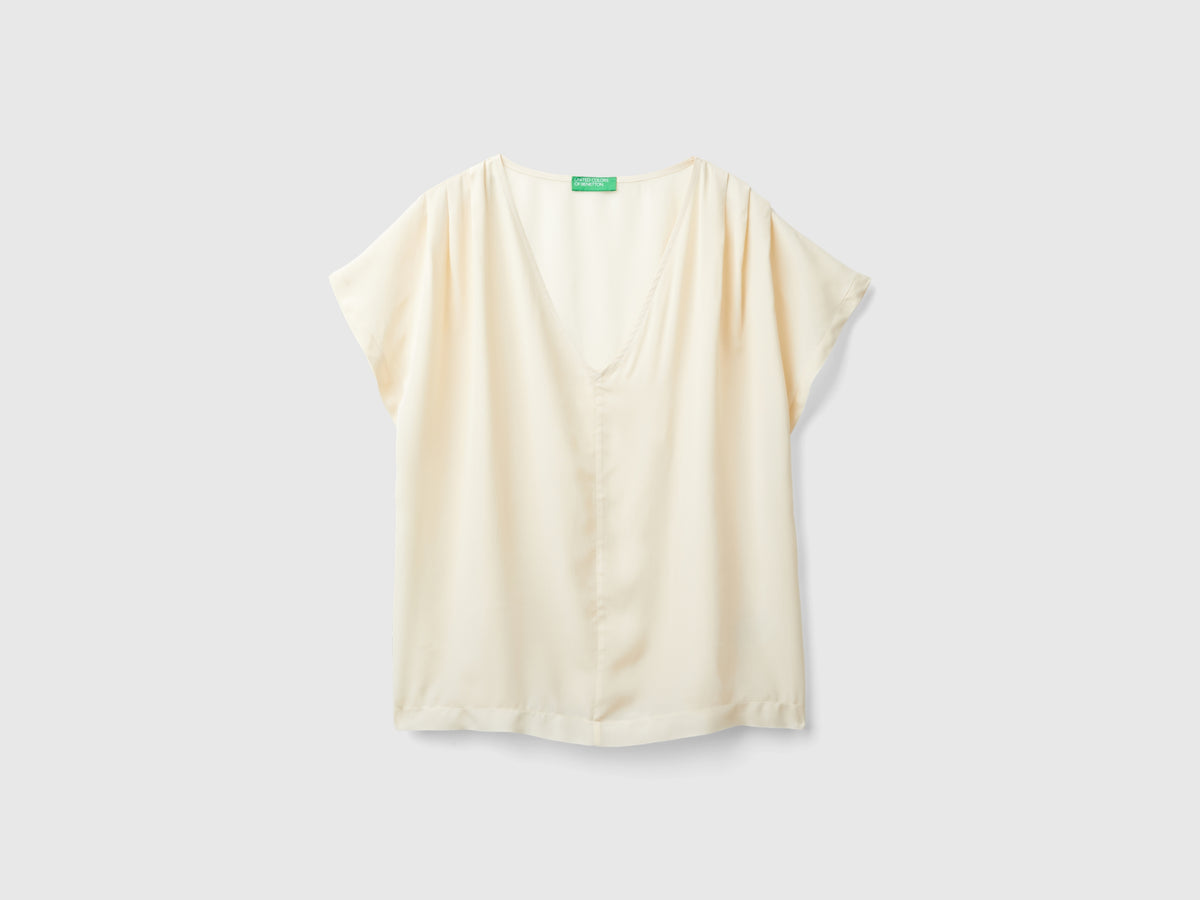 Blusa fluida a manica corta