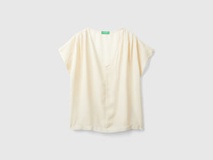 Blusa fluida a manica corta