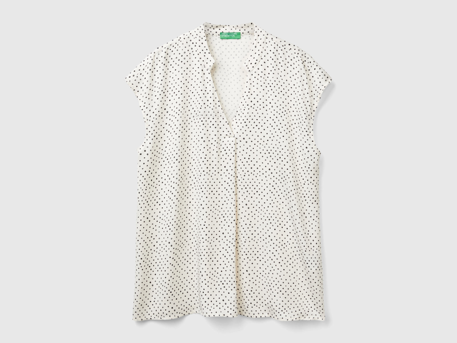 Blusa a pois in viscosa da donna bianco panna | Benetton Outlet
