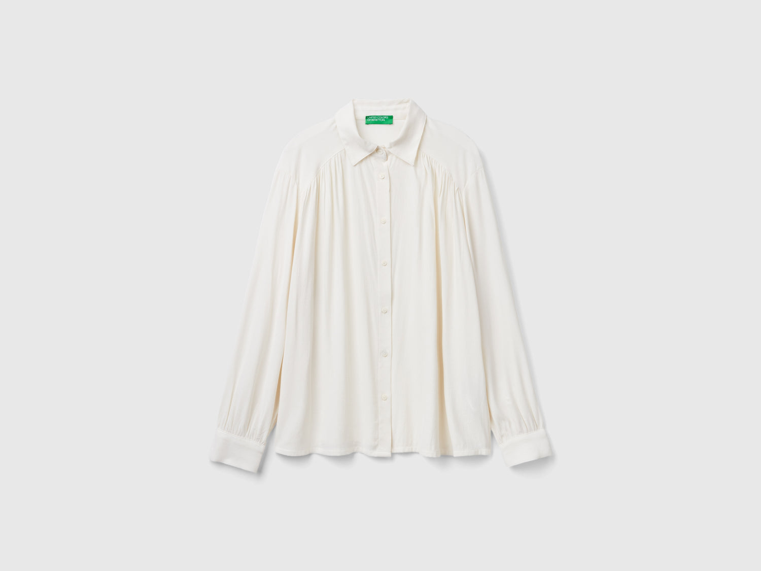 Camicia fluida relaxed fit da donna bianco panna | Benetton Outlet