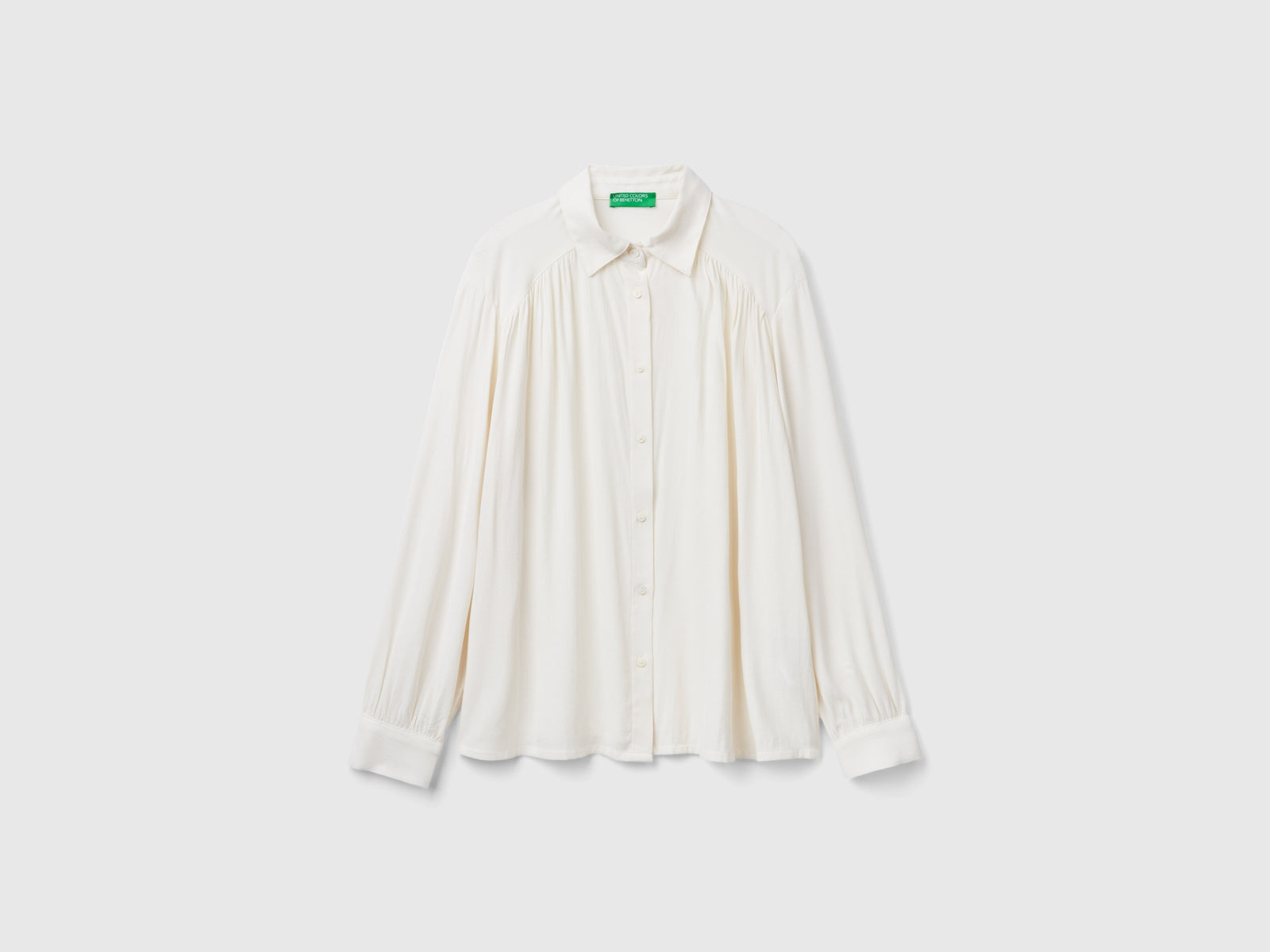 Camicia fluida relaxed fit da donna bianco panna | Benetton Outlet