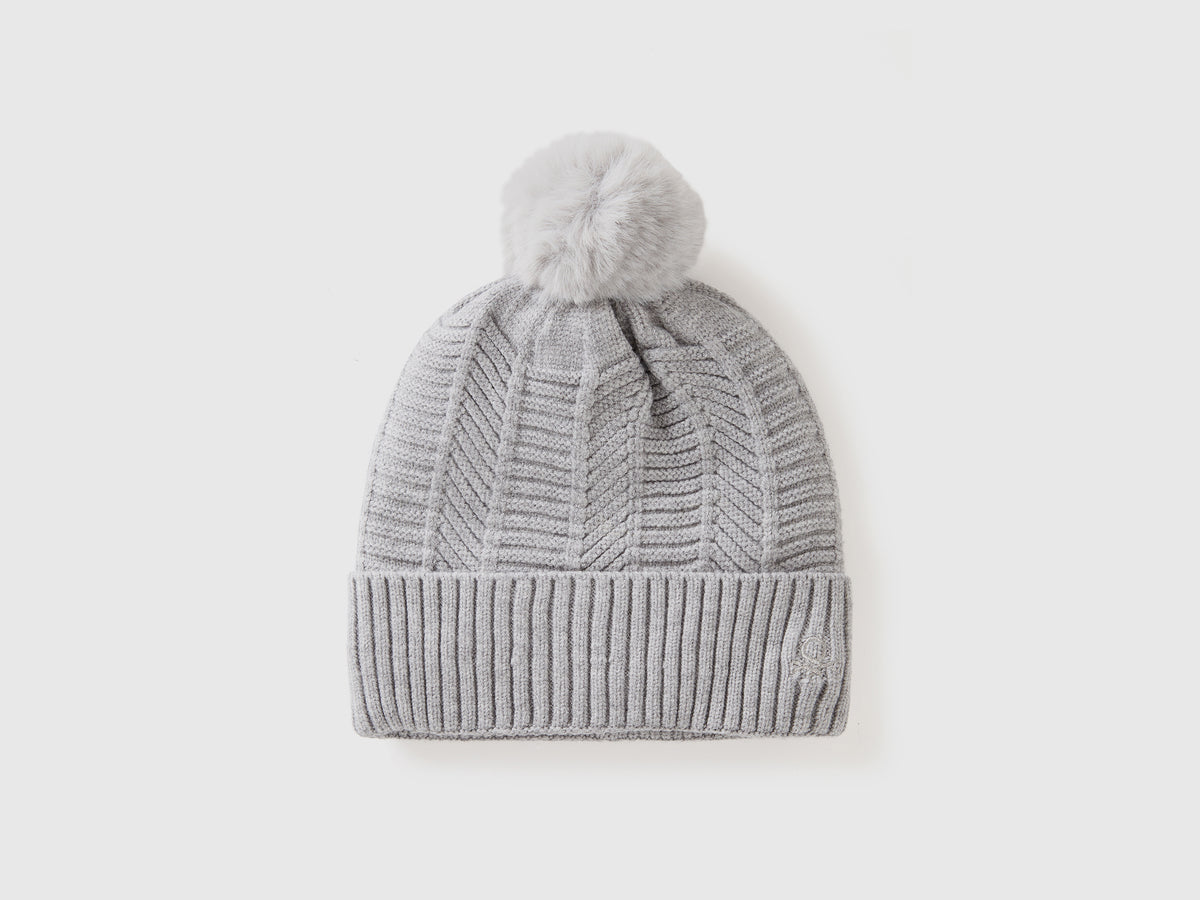 Cappello foderato con pom pom