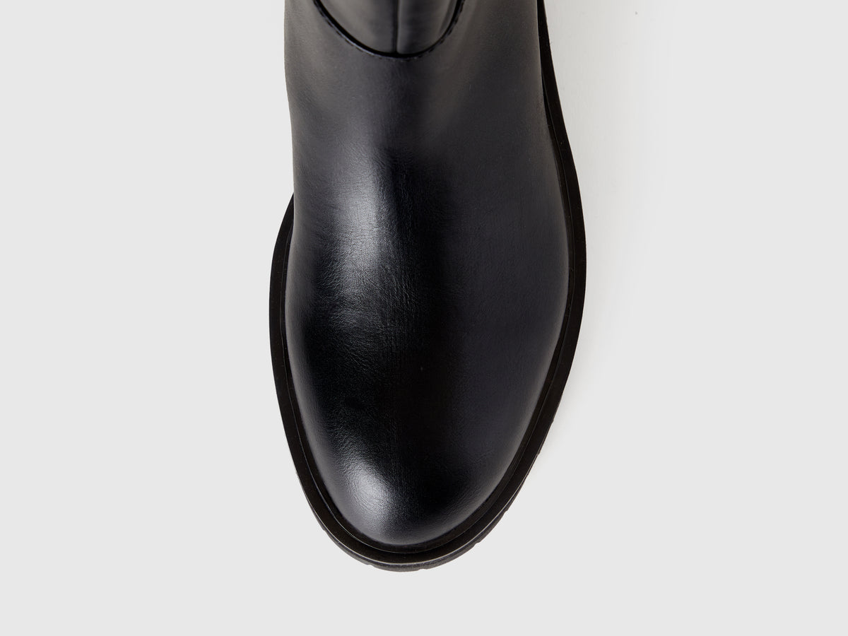 Botas altas en tejido revestido