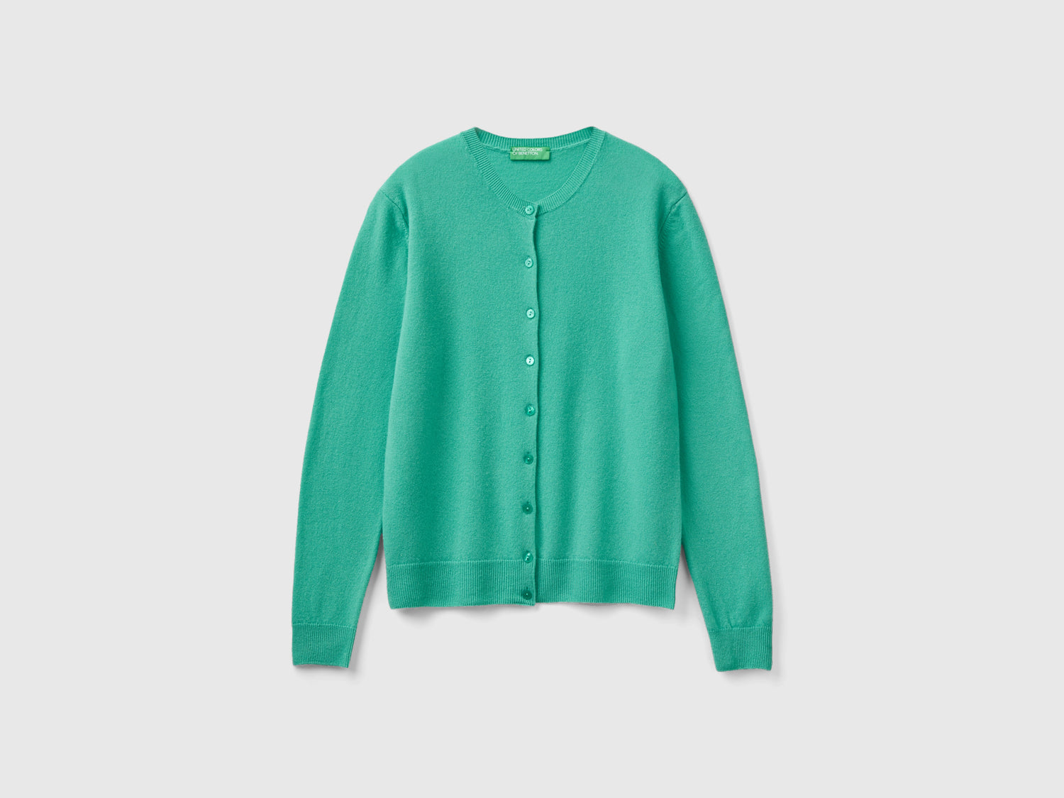 Cardigan girocollo chiaro in pura lana Merino da donna verde | Benetton Outlet