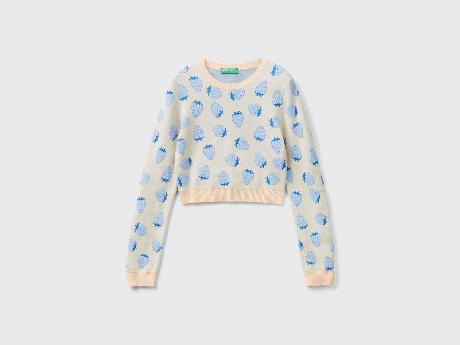 Maglia cropped con pattern fragole da donna rosa tenue | Benetton Outlet