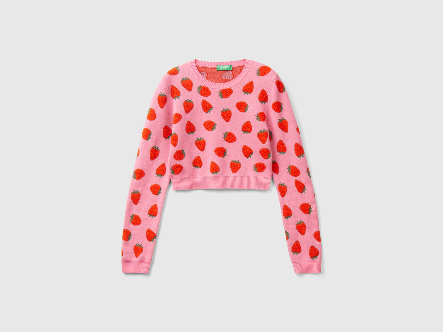Maglia cropped con pattern fragole da donna rosa | Benetton Outlet
