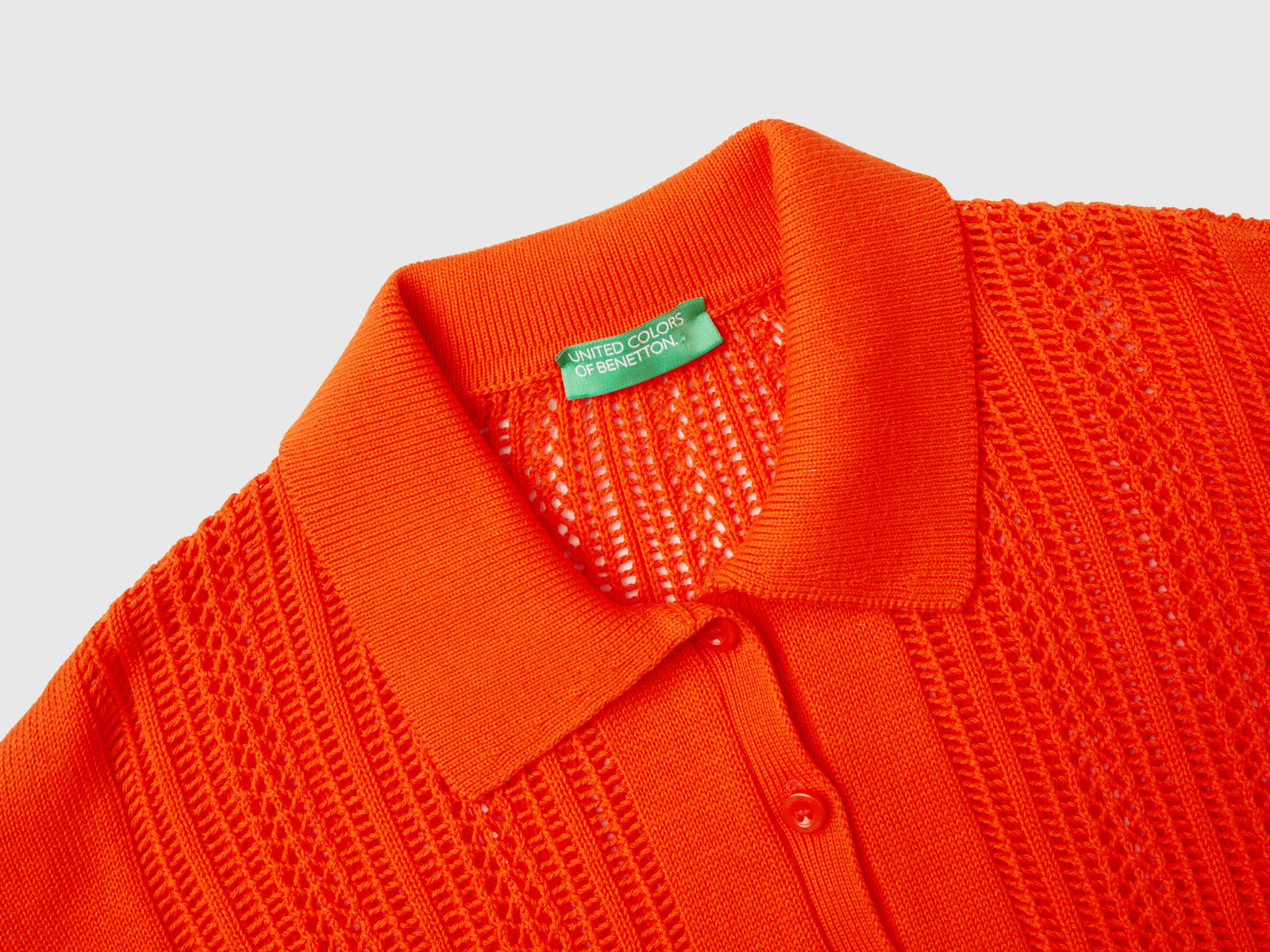 Polo in maglia crochet da donna rosso corallo 3 | Benetton Outlet