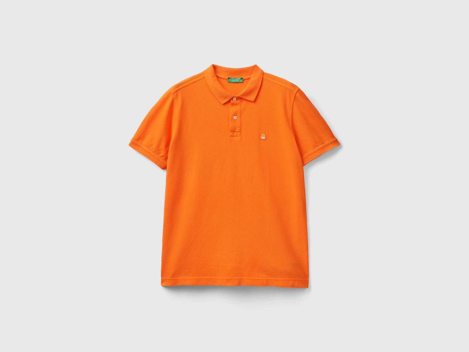 Polo de corte regular da uomo arancione | Benetton Outlet