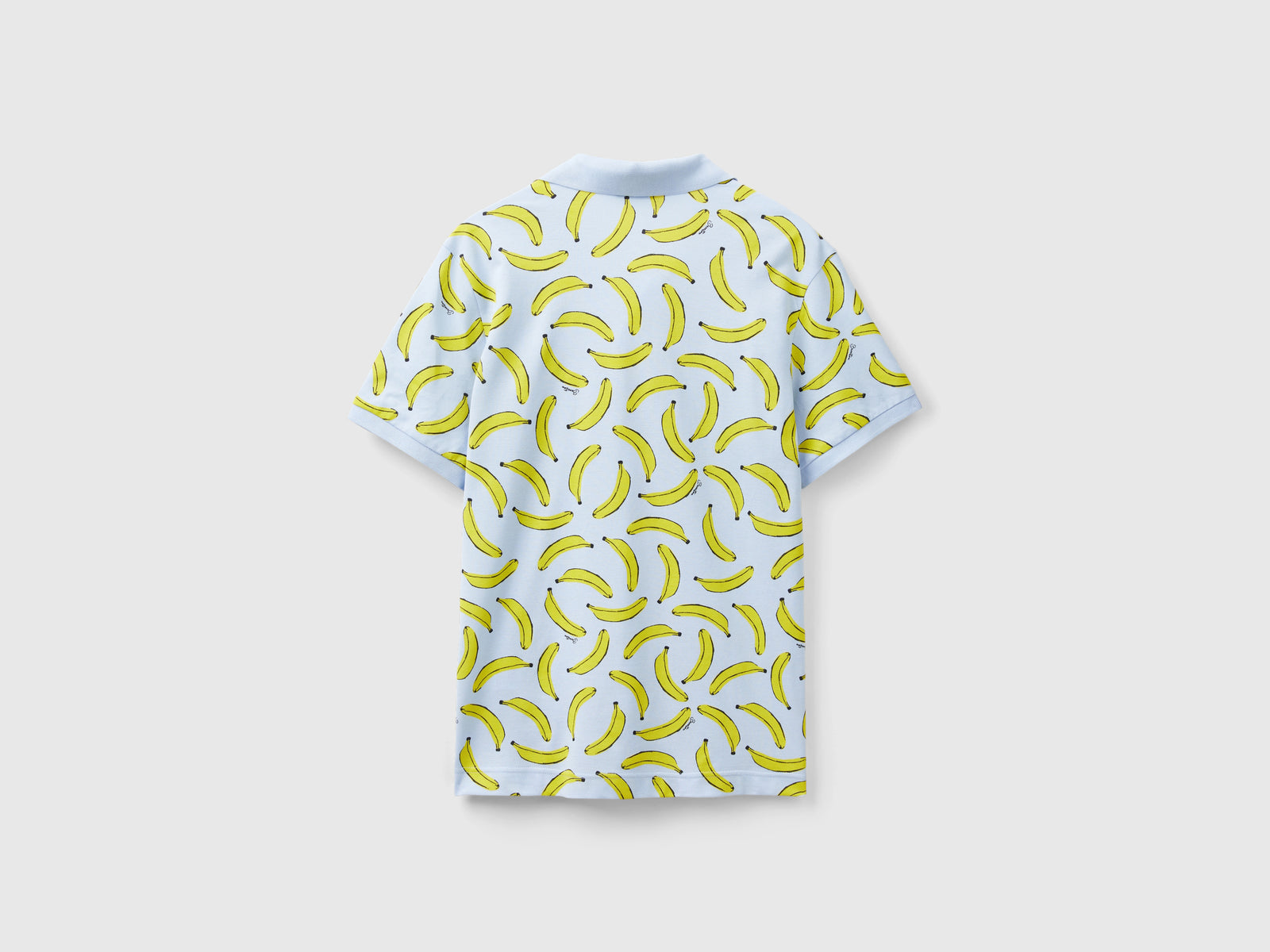 Polo con pattern banane in cotone da uomo celeste 2 | Benetton Outlet