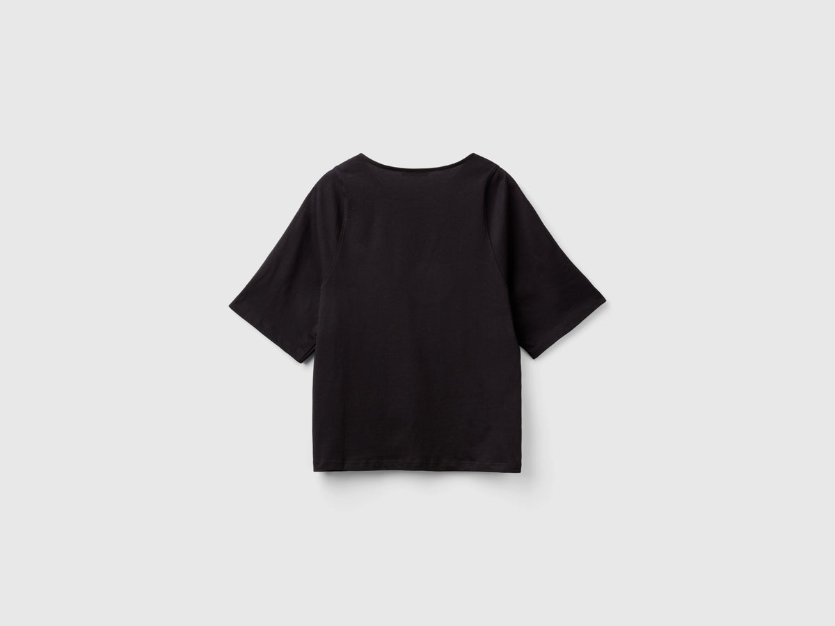 Maglietta con manica cut out