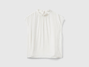 Blusa con rouches sul collo