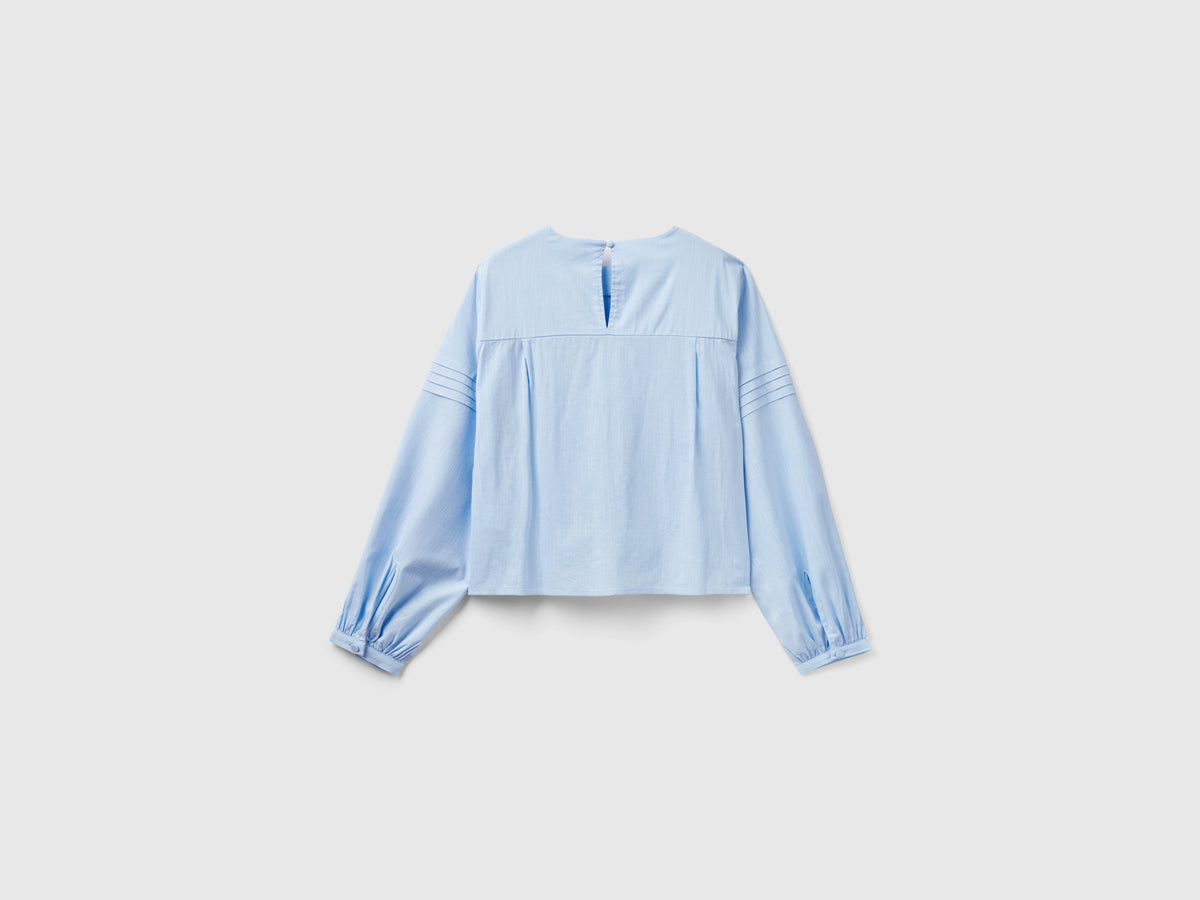 Blusa con pieghe in misto viscosa