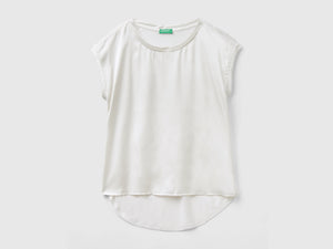Blusa con scollo a barchetta
