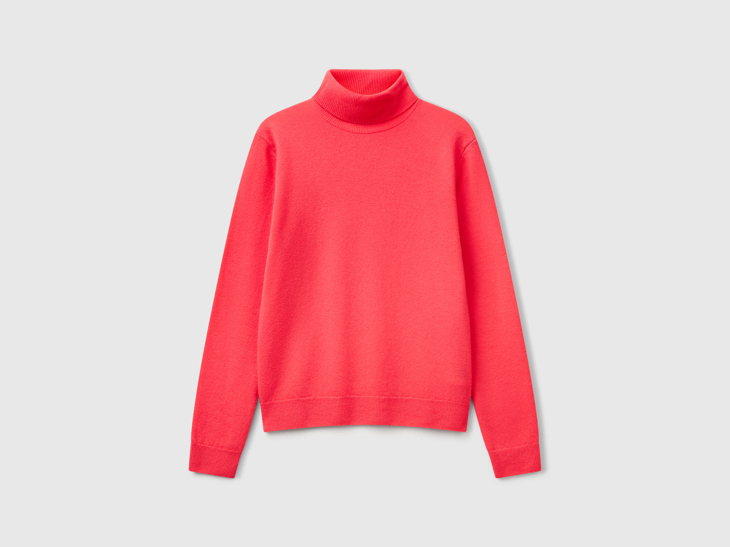 Maglione dolcevita ciclamino in pura lana Merino da donna salmone | Benetton Outlet