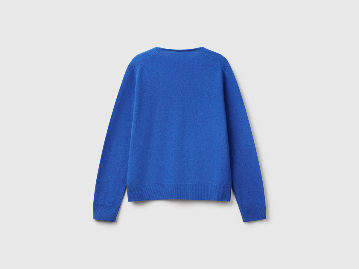 Maglione con scollo a V in pura lana Merino