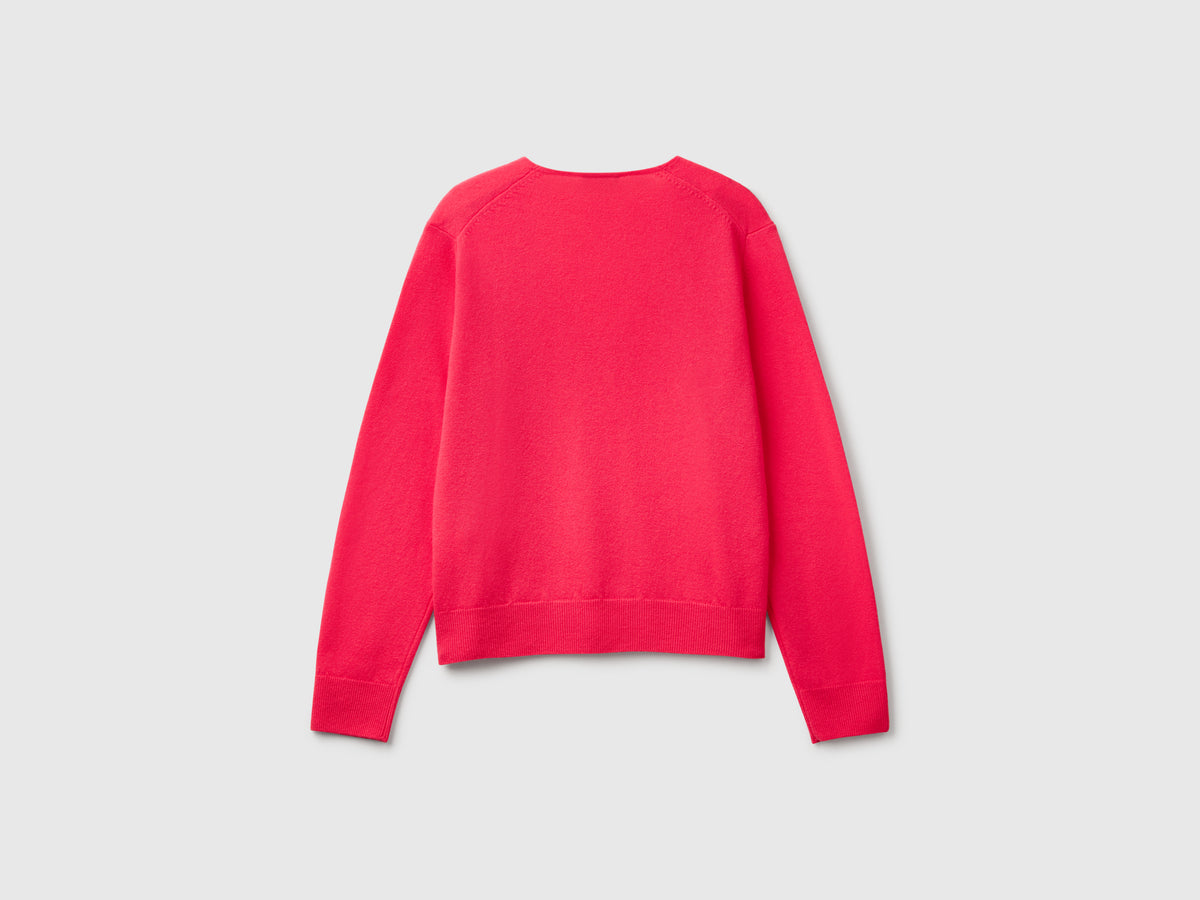 Maglione con scollo a V in pura lana Merino
