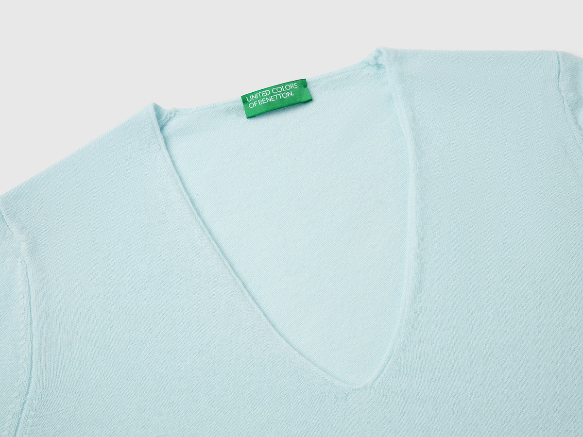 Maglione con scollo a V in pura lana Merino