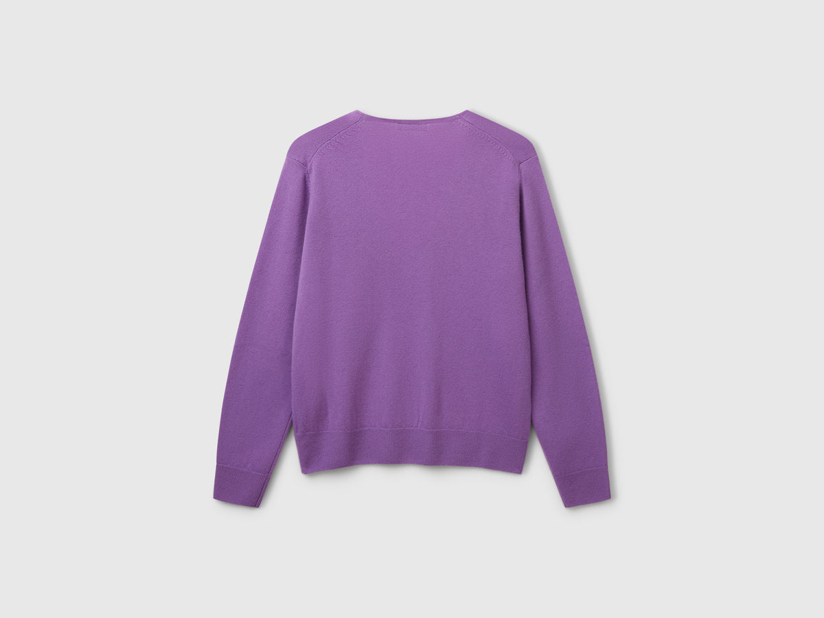 Maglione con scollo a V in pura lana Merino