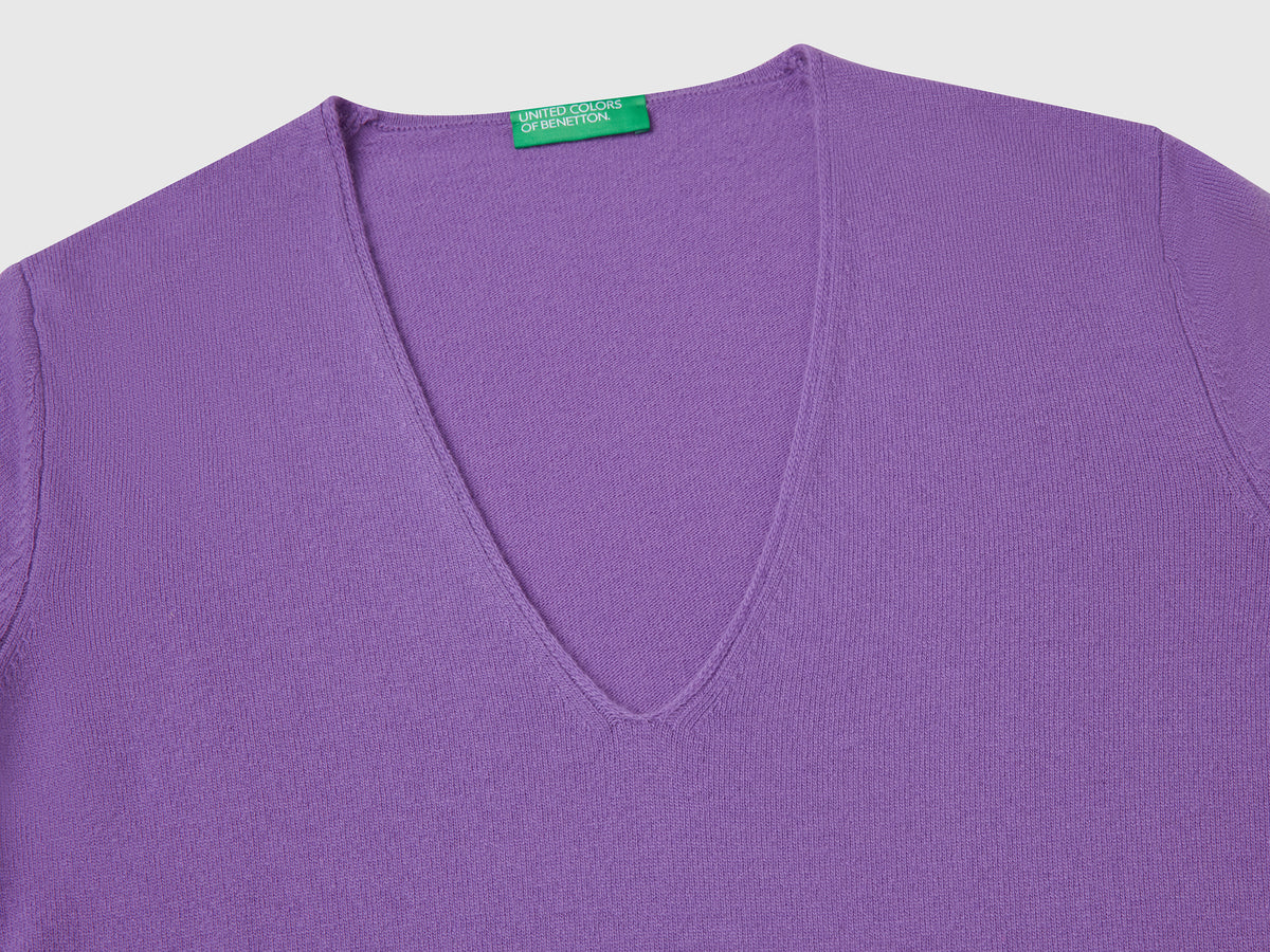 Maglione con scollo a V in pura lana Merino