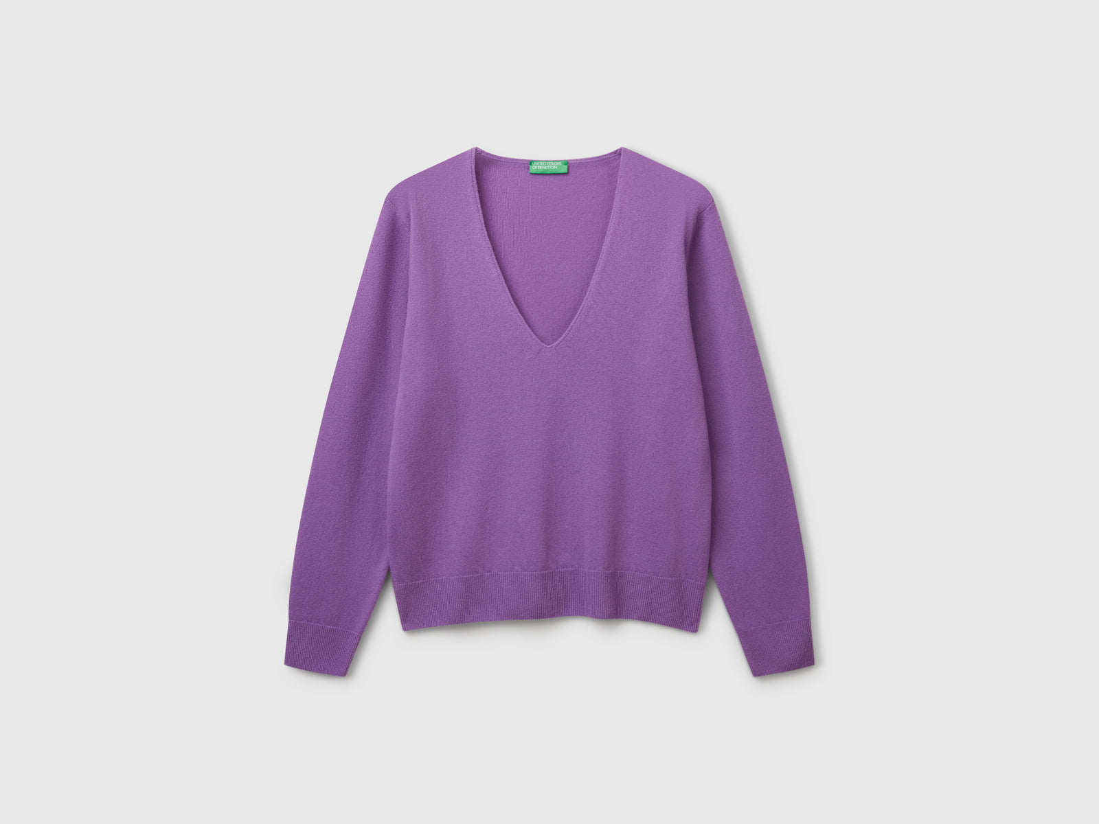 Maglione con scollo a V in pura lana Merino da donna viola | Benetton Outlet