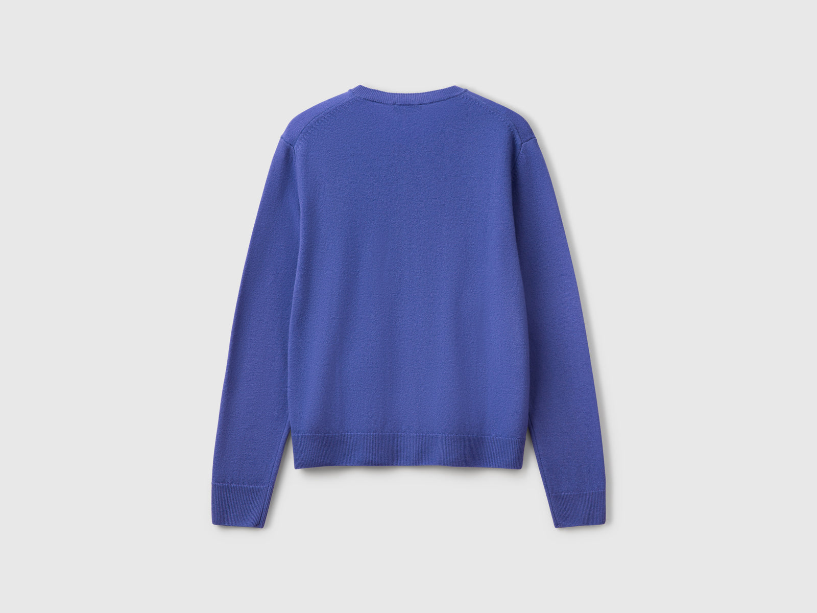 Crew neck cardigan in pure Merino wool da donna bluette 2 | Benetton Outlet