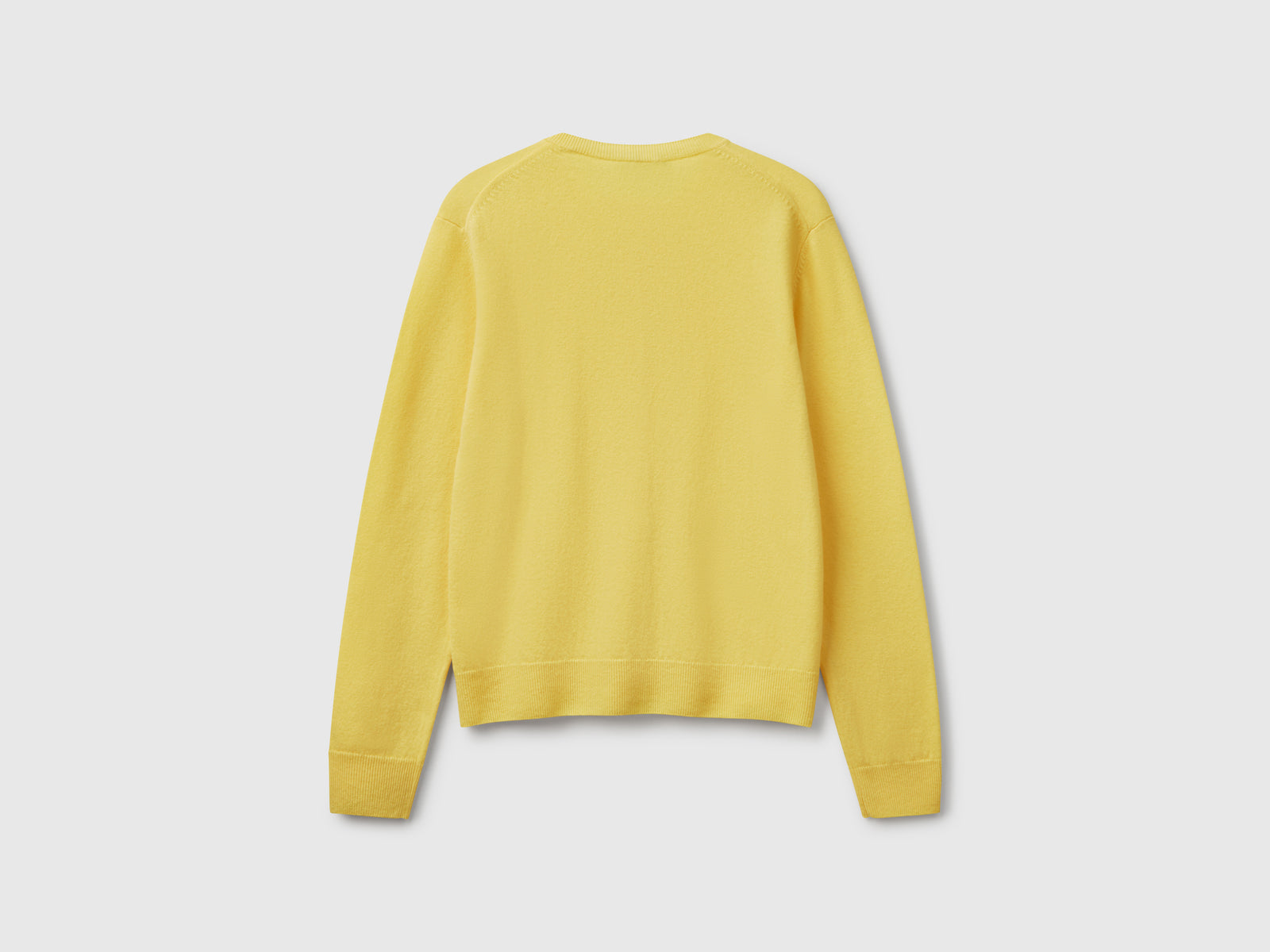Crew neck cardigan in pure Merino wool da donna giallo 2 | Benetton Outlet