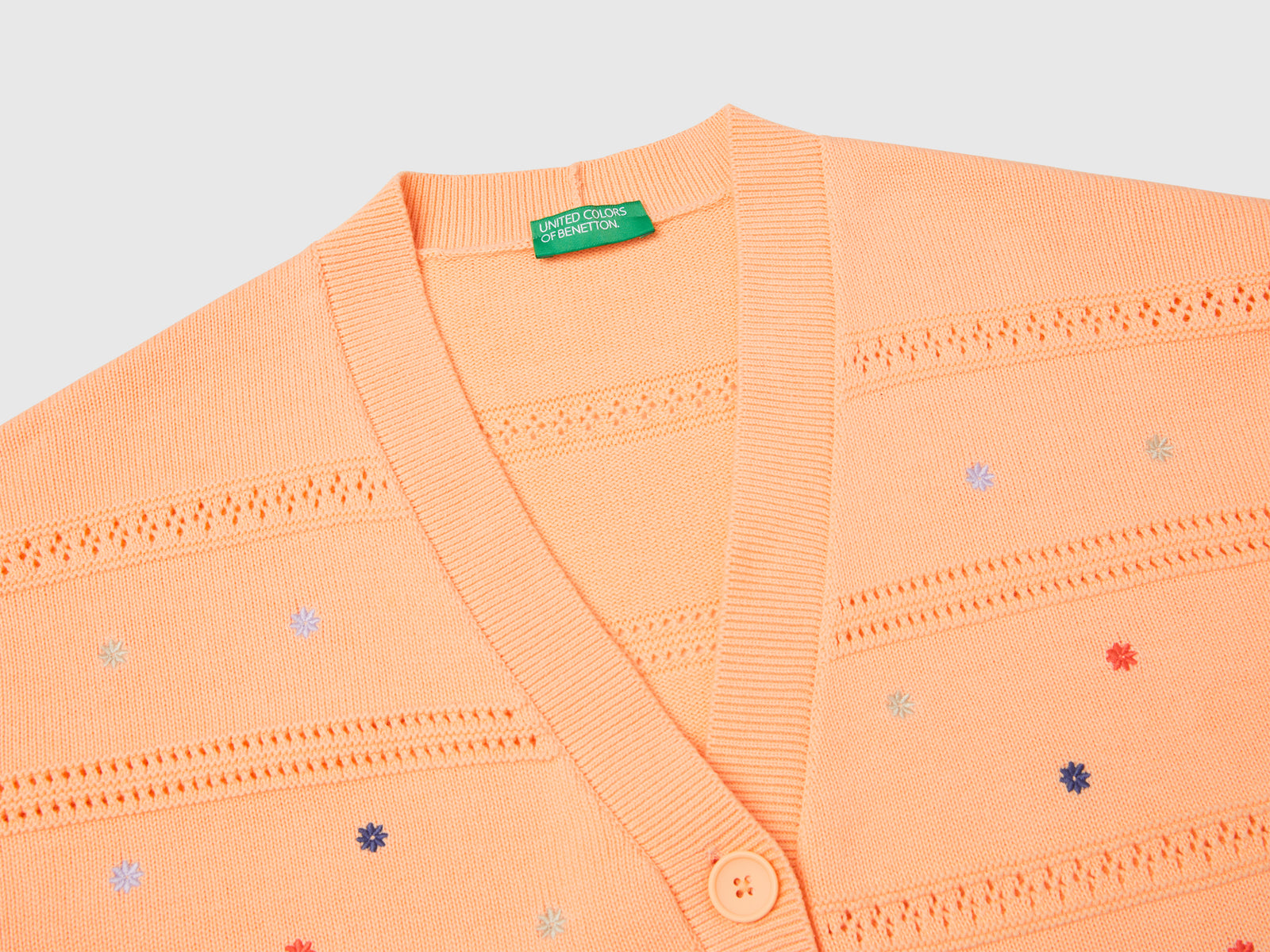 Cardigan con fiori ricamati da donna pesca 3 | Benetton Outlet