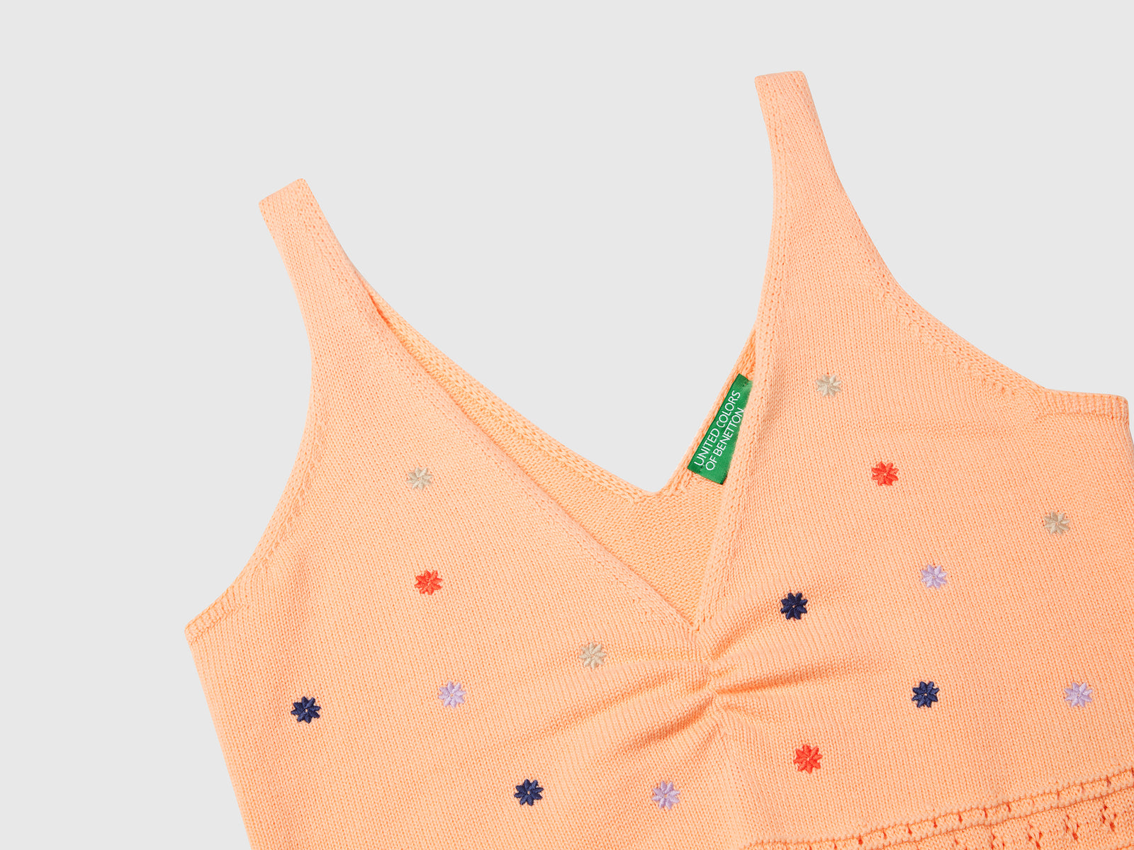 Canotta in maglia con ricamo fiori da donna pesca 3 | Benetton Outlet