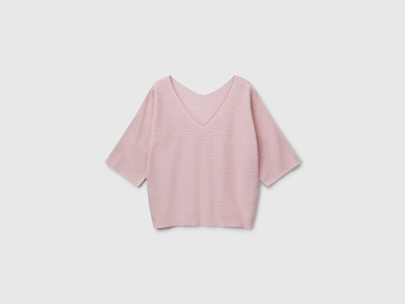 Maglia reversibile cropped da donna rosa tenue | Benetton Outlet