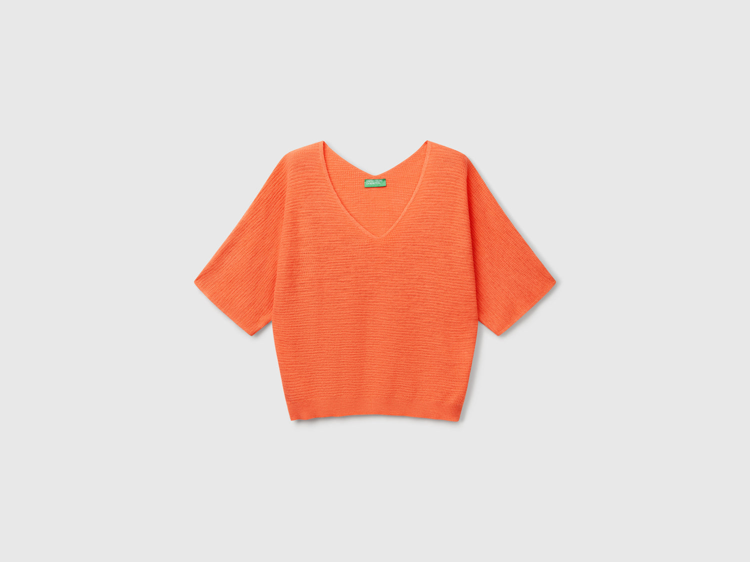 Maglia reversibile cropped da donna arancione | Benetton Outlet